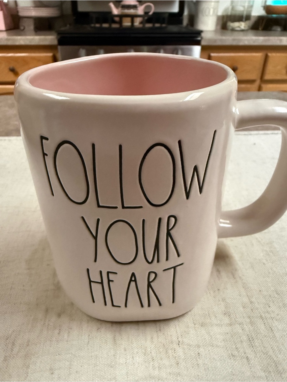 Rae Dunn Ceramic Mug - White Exterior with Pink Interior, 'Follow Your Heart'